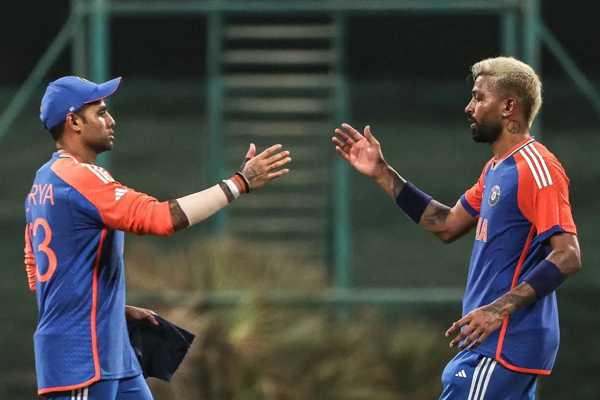 India's captain Suryakumar Yadav (L) and his teammate Hardik Pandya celebrate after their team's win in the Asia Cup 2025 Twenty20 international cricket match between India and Oman at the Sheikh Zayed Cricket Stadium in Abu Dhabi. | Photo: AFP