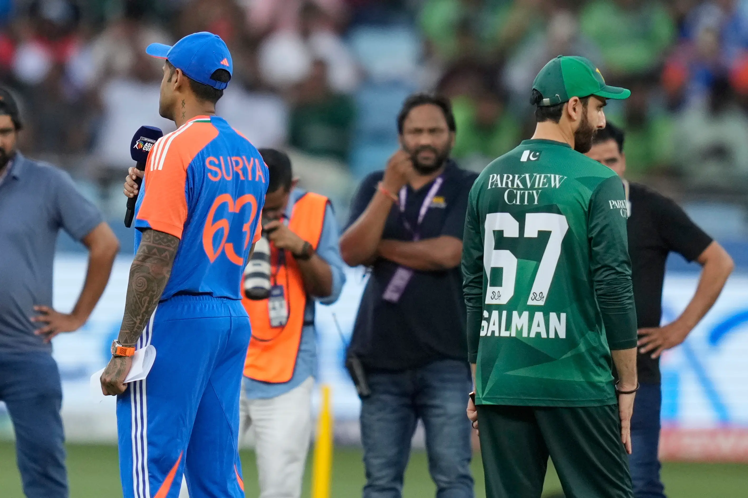 India's captain Suryakumar Yadav, left, speaks as Pakistan's captain Salman Agha, right, looks on ahead of the Asia Cup cricket match | Photo: AP
