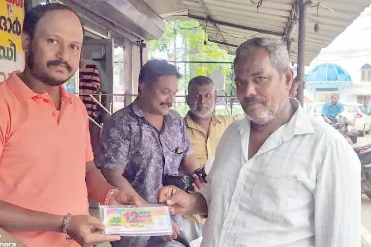 500 രൂപയുടെ സമ്മാനം ലക്ഷമായി; മോനച്ചന് ഇത് വൈകിവന്ന ബമ്പർ