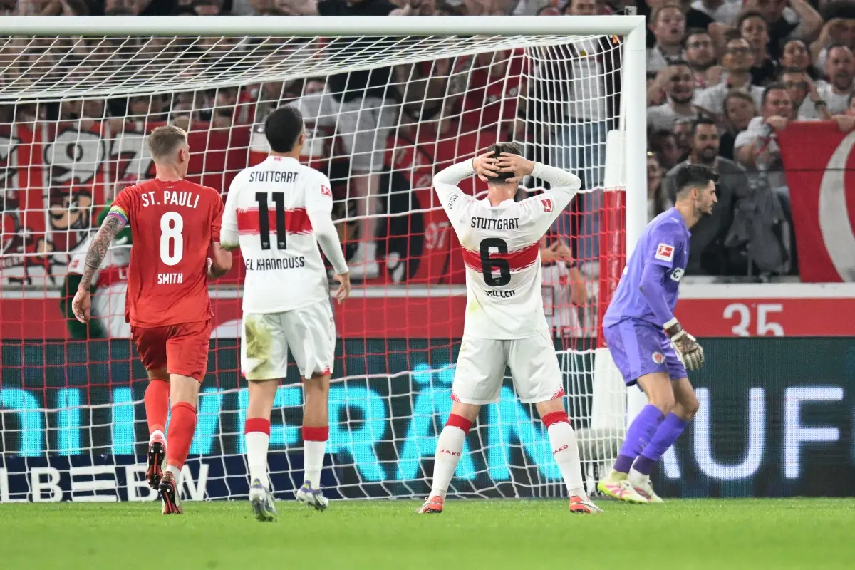 Stuttgart's German midfielder #06 Angelo Stiller (2nd R) reacts after failing to score on a penalty kick during the German first division Bundesliga football match between VfB Stuttgart and St Pauli in Stuttgart, southern Germany. | Photo: AFP