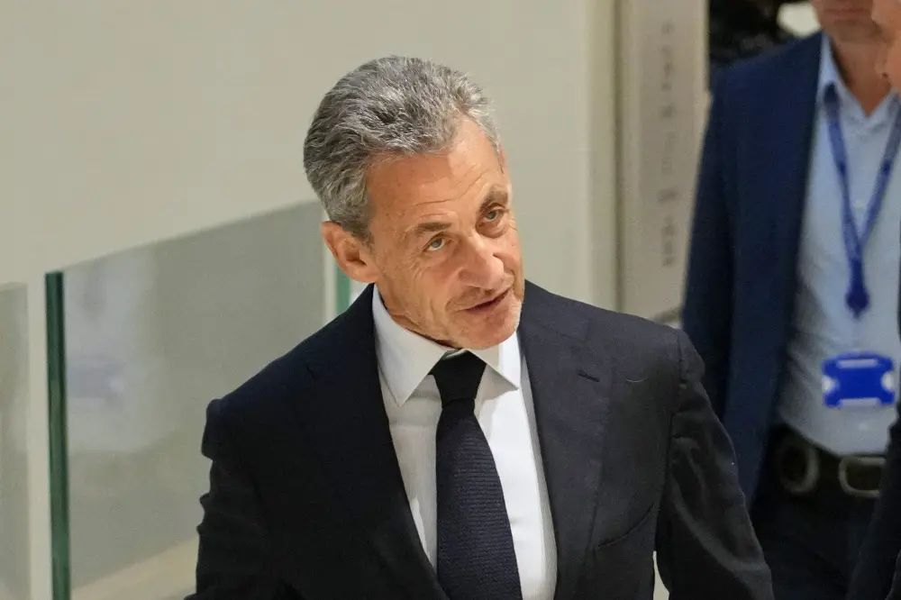 Former French President Nicolas Sarkozy arrives at the courthouse in Paris | AP