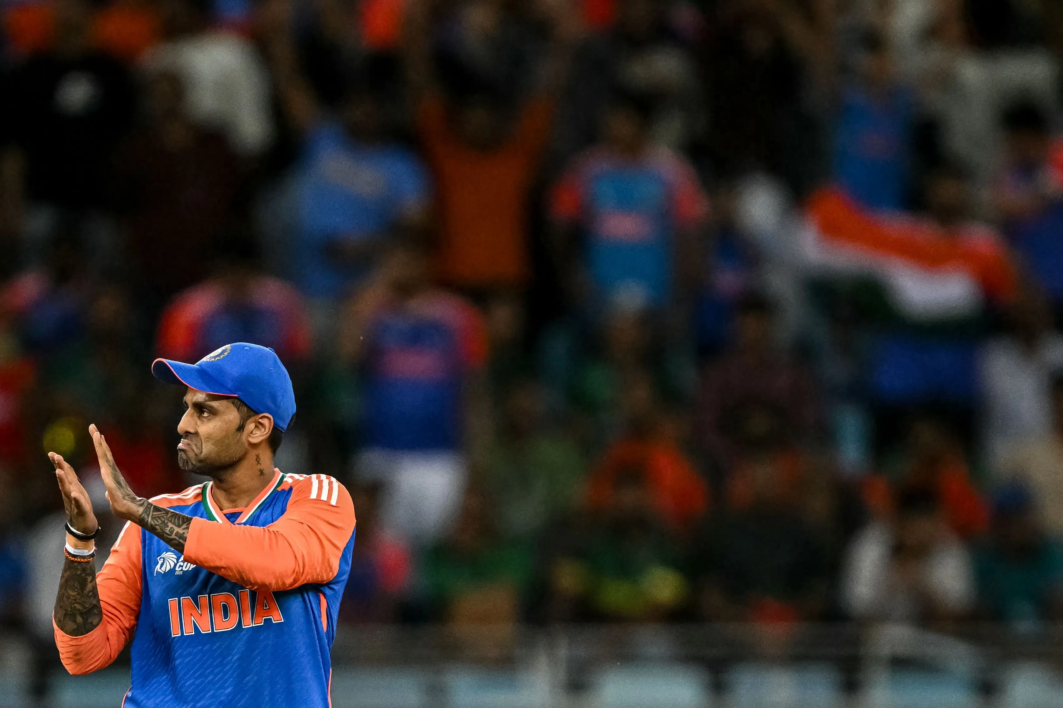 India's captain Suryakumar Yadav celebrates after the dismissal of Bangladesh's Towhid Hridoy during the Asia Cup 2025 Super Four Twenty20 international cricket match between Bangladesh and India at the Dubai International Stadium in Dubai on September 24 | Photo: AFP