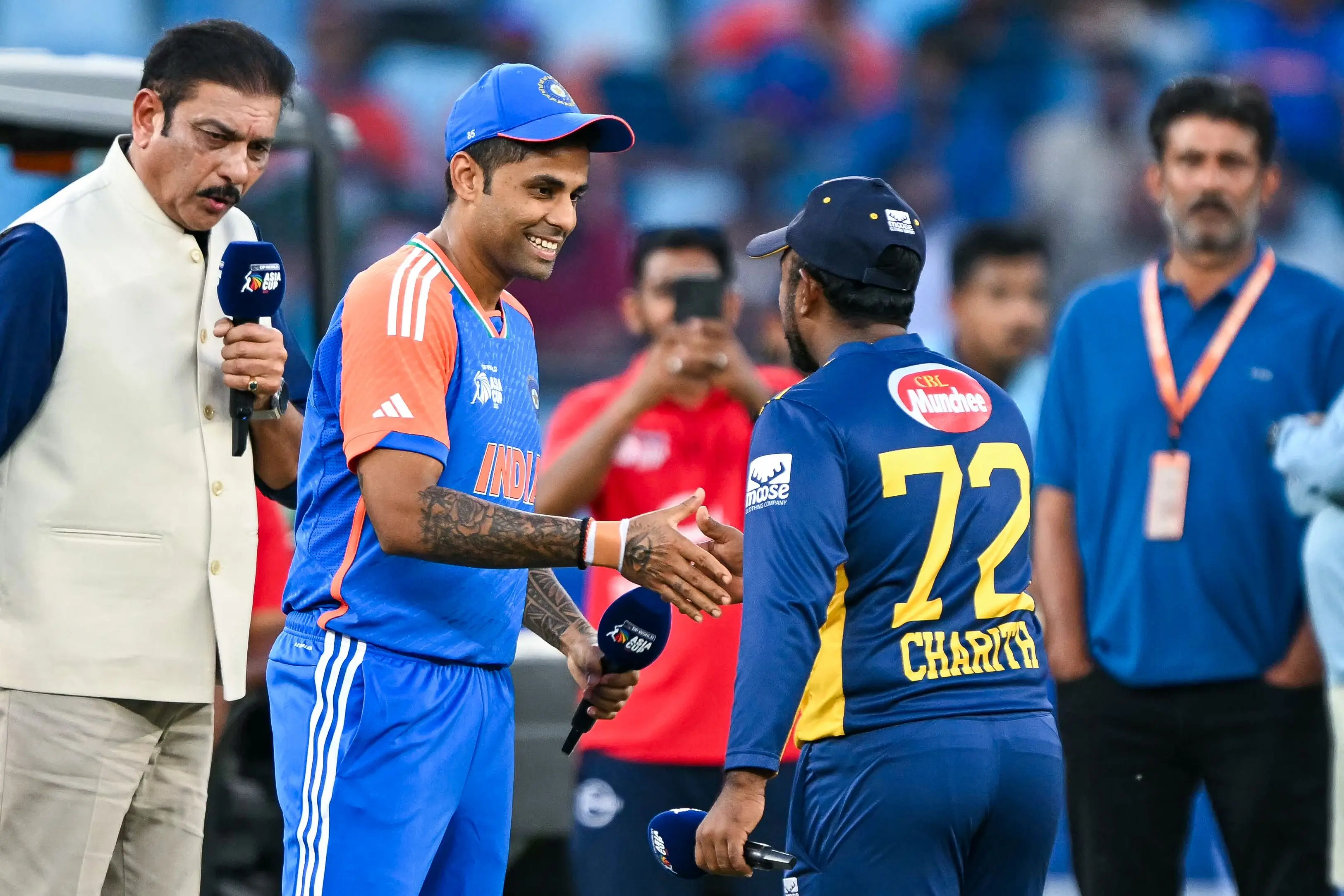 India's captain Suryakumar Yadav shakes hands with his Sri Lankan counterpart Charith Asalanka after the toss for the Asia Cup 2025 Super Four Twenty20 international cricket match between India and Sri Lanka | Photo: AFP