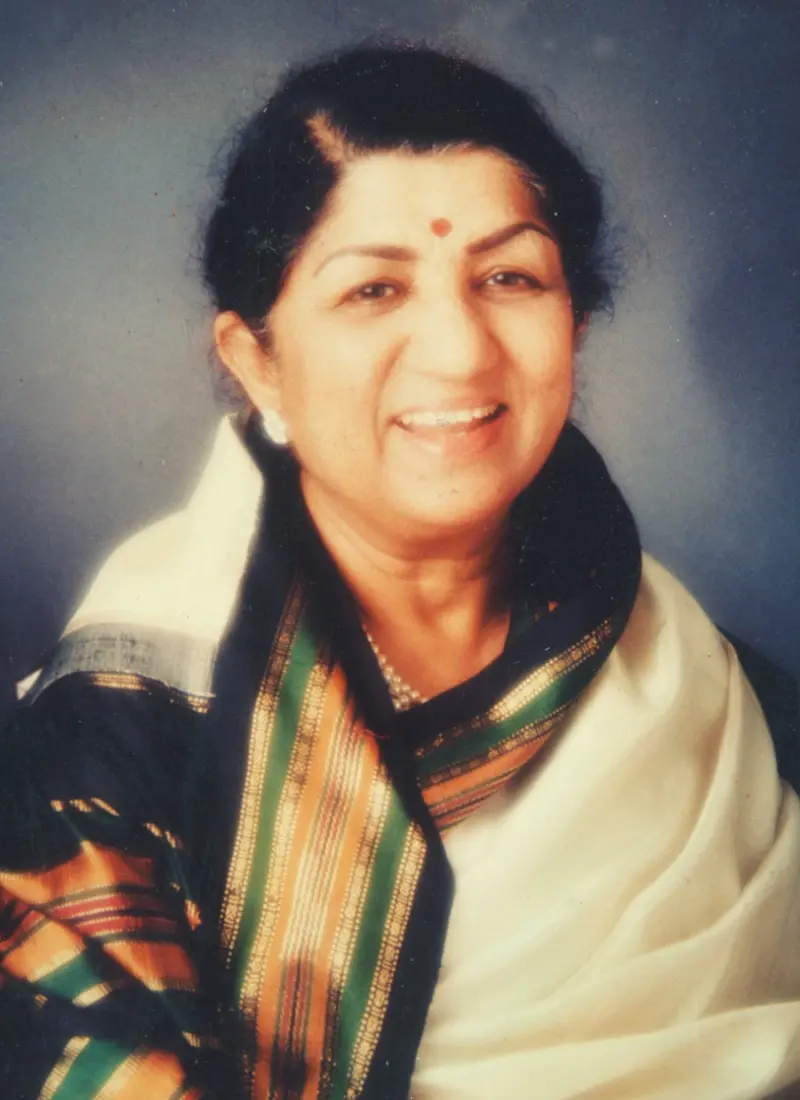 Lata Mangeshkar, the Nightingale of India, whose timeless voice continues to echo through generations. On her birth anniversary, we remember her legacy through seven of her most unforgettable songs. Photo: MBI