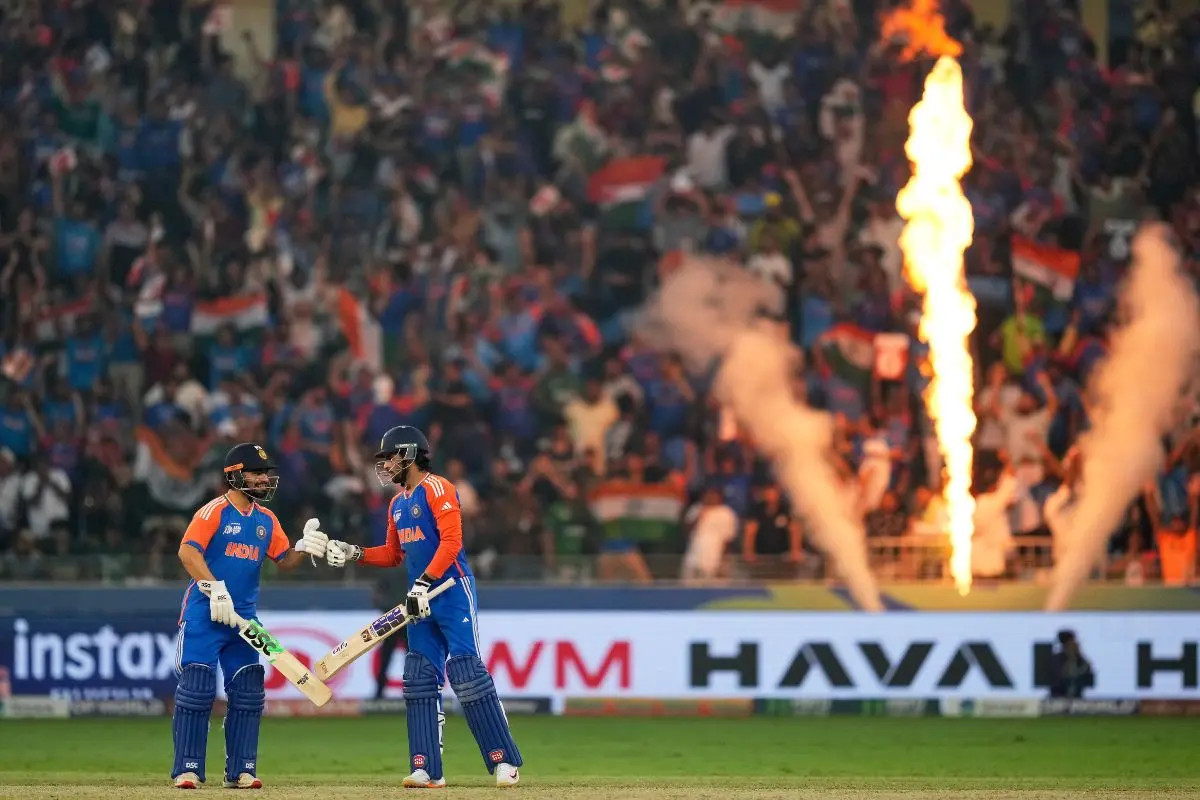 India's Rinku Singh, left, congratulates batting partner Tilak Varma after the latter hit a six during the Asia Cup cricket final between India and Pakistan (Photo: AP/PTI)