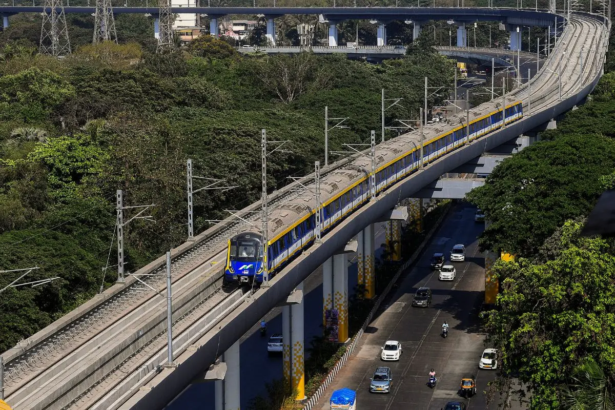 A metro train passes during the trial run of the Metro Line 2B, also known as Yellow Line | Photo: PTI
