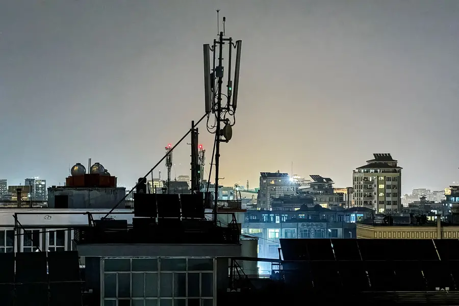 A general view shows a telecommunications antenna installed for internet services on the rooftop of a house in Kabul