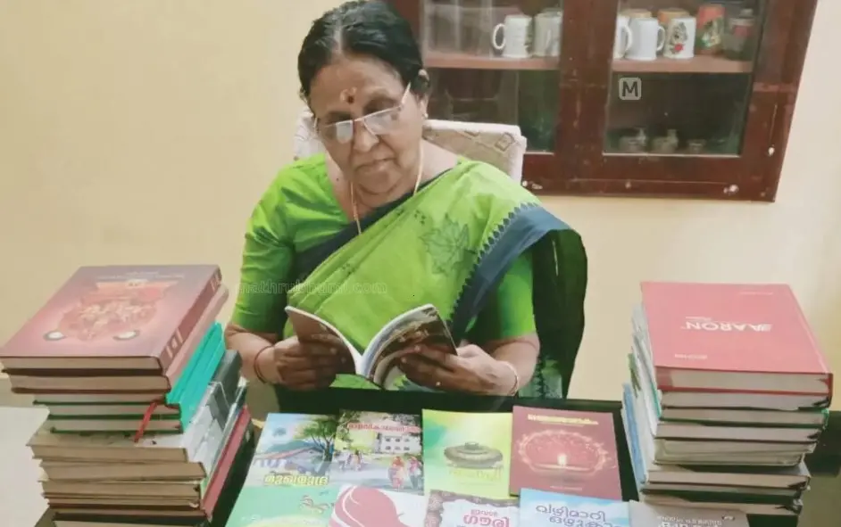 Sreekumari Shankaranelloor with her published works and diaries containing short stories | Mathrubhumi