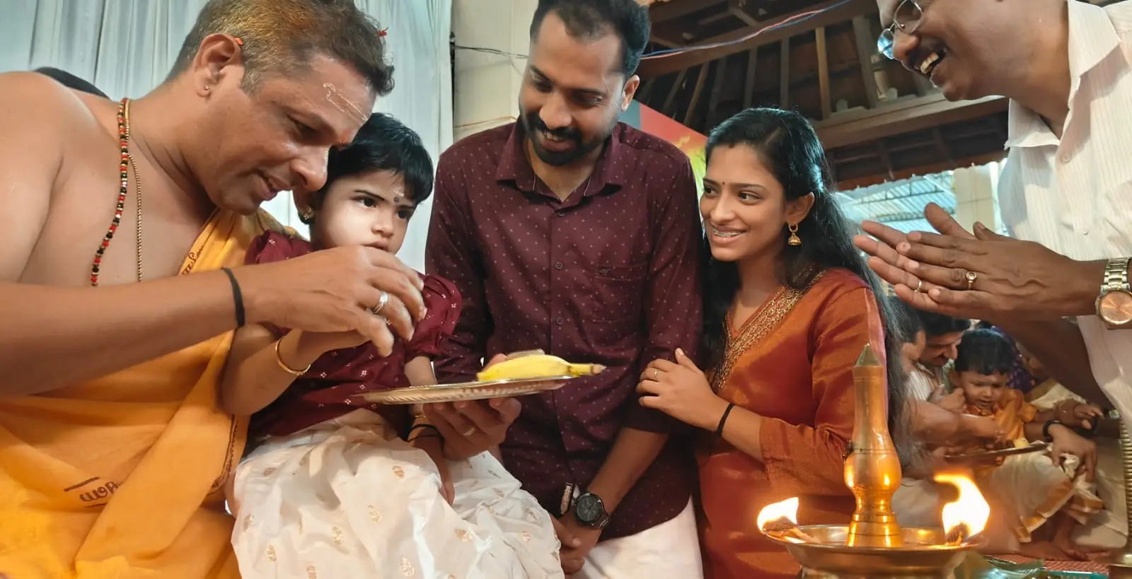 Children being initiated into the world of letters at a Vidyarambham ceremony in Kerala | Photo: Mathrubhumi