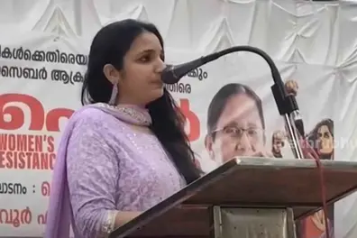 Rini Ann George appears at CPM event, welcomed by party leader amid cyber attack fears
