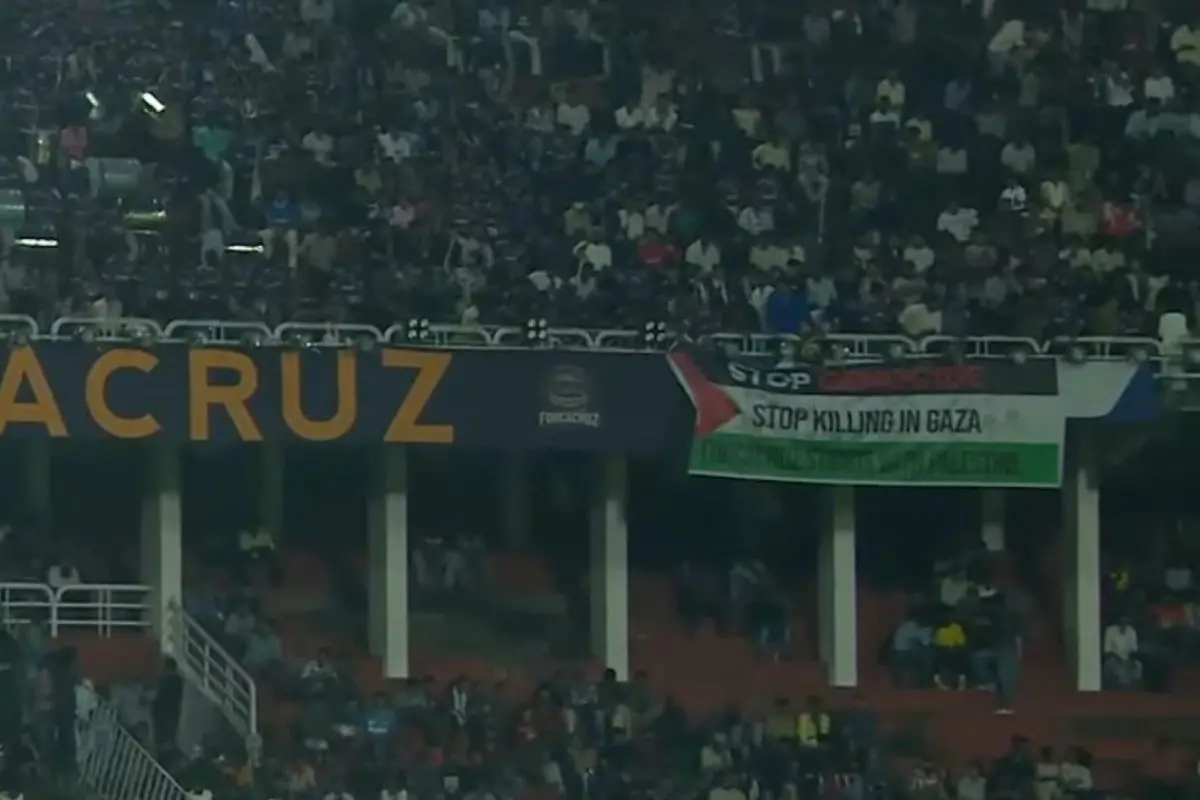 Pro-Palestine banner spotted in the stands during SLK Season 2 opener in Kozhikode. Photo: X/@abdulrahmanmash