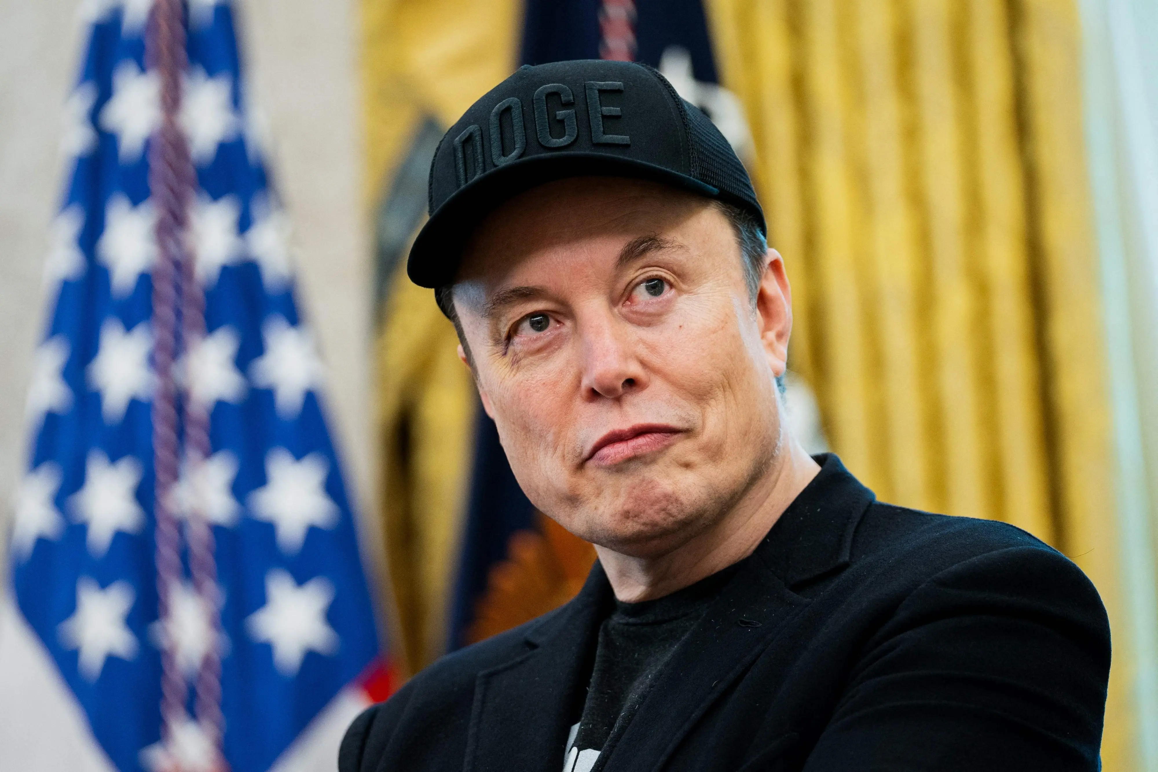 Elon Musk | Photo by Allison ROBBERT / AFP