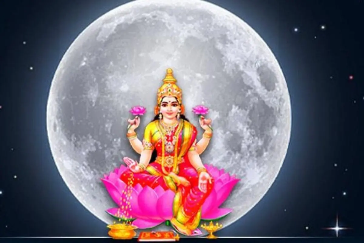 Goddess Lakshmi idol illuminated against the radiant full moon on Sharad Purnima night, symbolizing prosperity, purity, and divine grace. (File Photo)