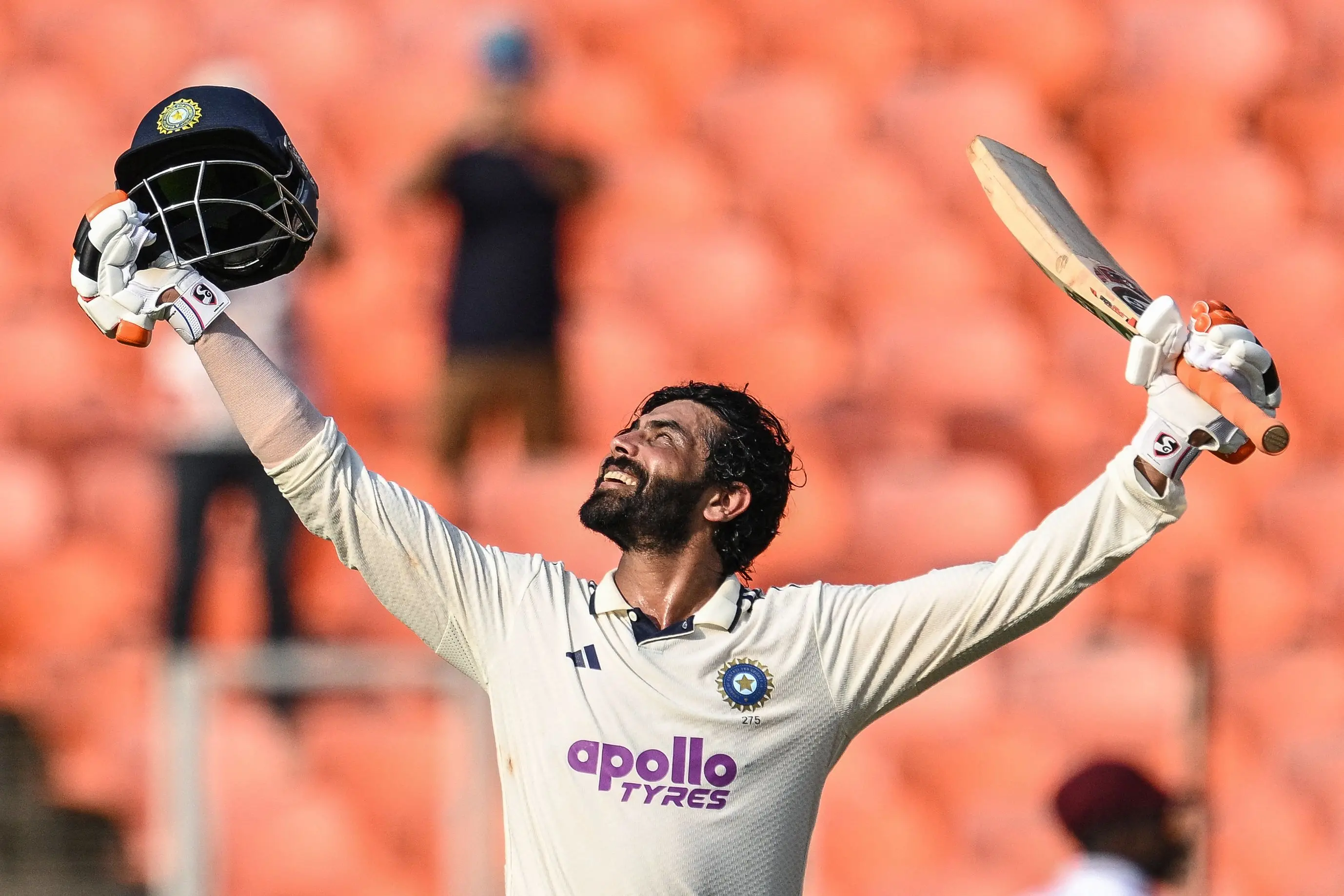 Ravindra Jadeja celebrates after scoring a century during the second day of the first Test cricket match between India and the West Indies | AFP