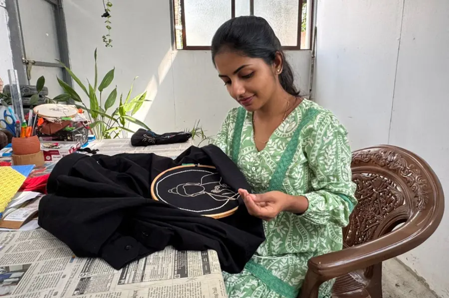 Anjana Shaji is busy with embroidery for 'One Hand Embroidery'