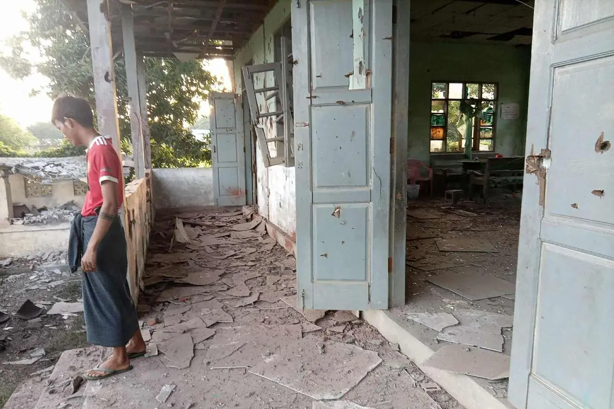 This UGC photo courtesy of Facebook user Yebaw Hlyat Cee taken on October 7, 2025 and received on October 8 shows damage to a building next to the site of a military strike on a protest in central Myanmar's Chaung U township (Photo: AFP)