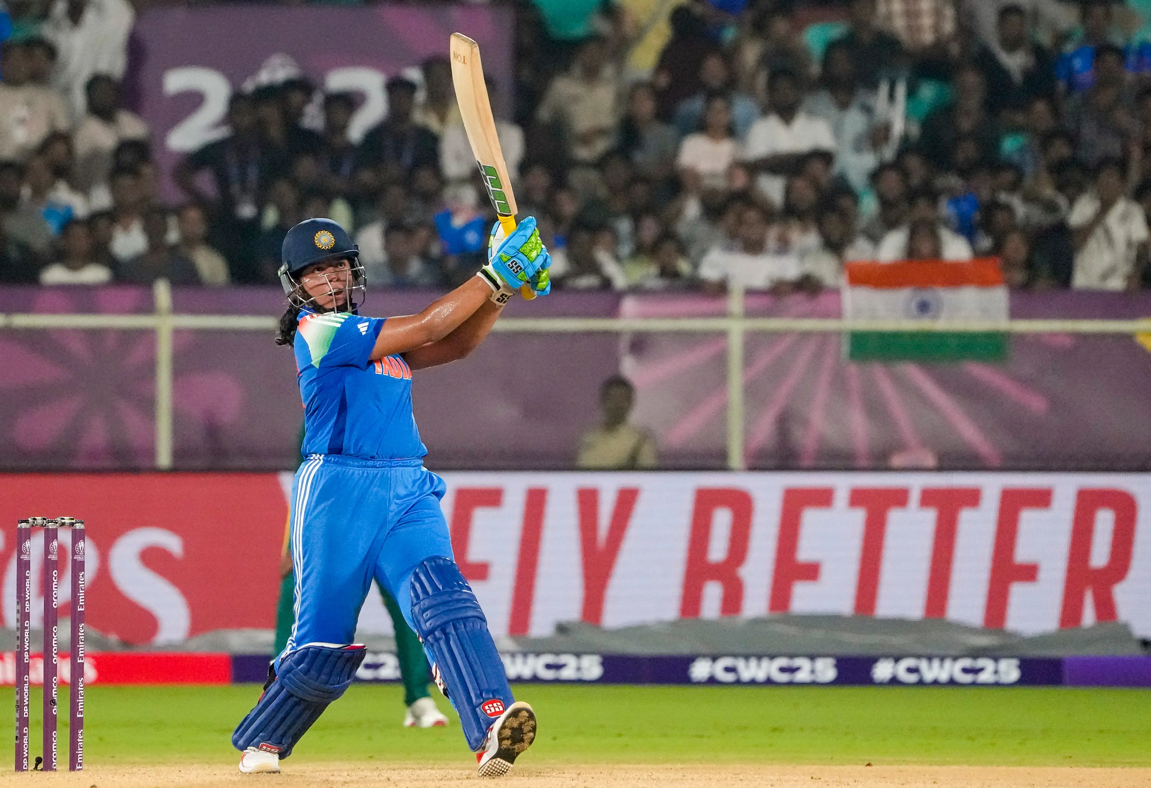 India's Richa Ghosh plays a shot during the ICC Women's World Cup ODI cricket match between India Women and South Africa Women, at the ACA-VDCA International Cricket Stadium, in Visakhapatnam. | Photo: PTI