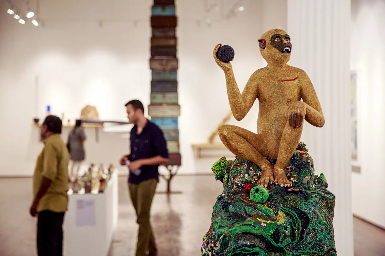 People visit an exhibition during the 5th edition of the Kochi-Muziris Biennale (Kochi art festival) with the theme 'In Our Veins Flow Ink and Fire', in Kochi 2022. | Photo: ANI