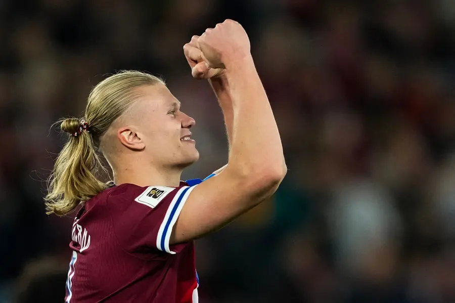 Erling Haaland celebrates scoring his second goal