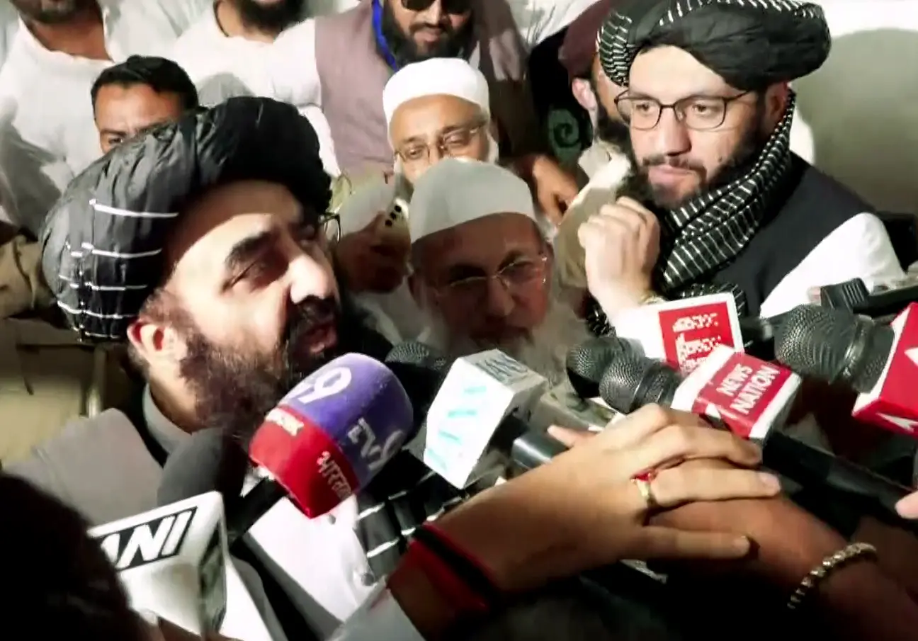 Afghanistan's Foreign Minister Mawlawi Amir Khan Muttaqi speaks to the media on his arrival at Darul Uloom in Deoband, in Saharanpur on Saturday. (ANI Video Grab)