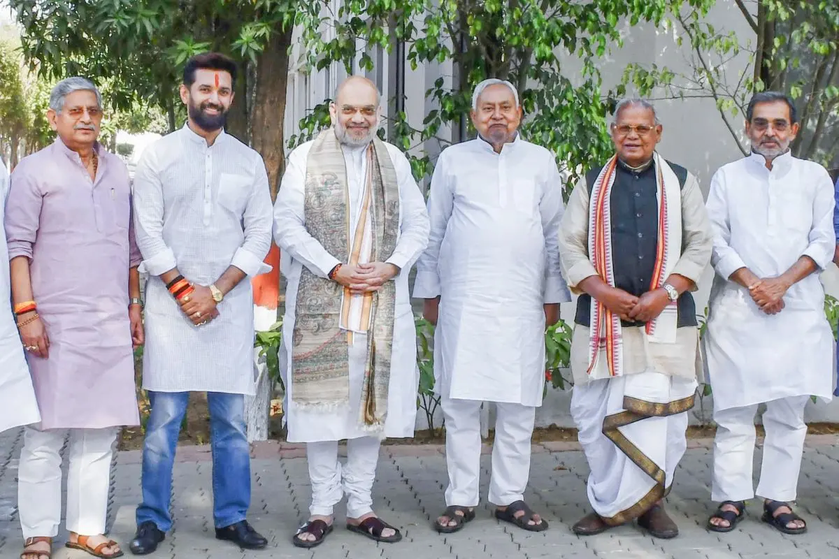 Union Ministers Amit Shah, Jitan Ram Manjhi, Rajiv Ranjan (Lalan) Singh, Chirag Paswan, Bihar Chief Minister Nitish Kumar and other pose for a group picture during the NDA (National Democratic Alliance) leaders meeting