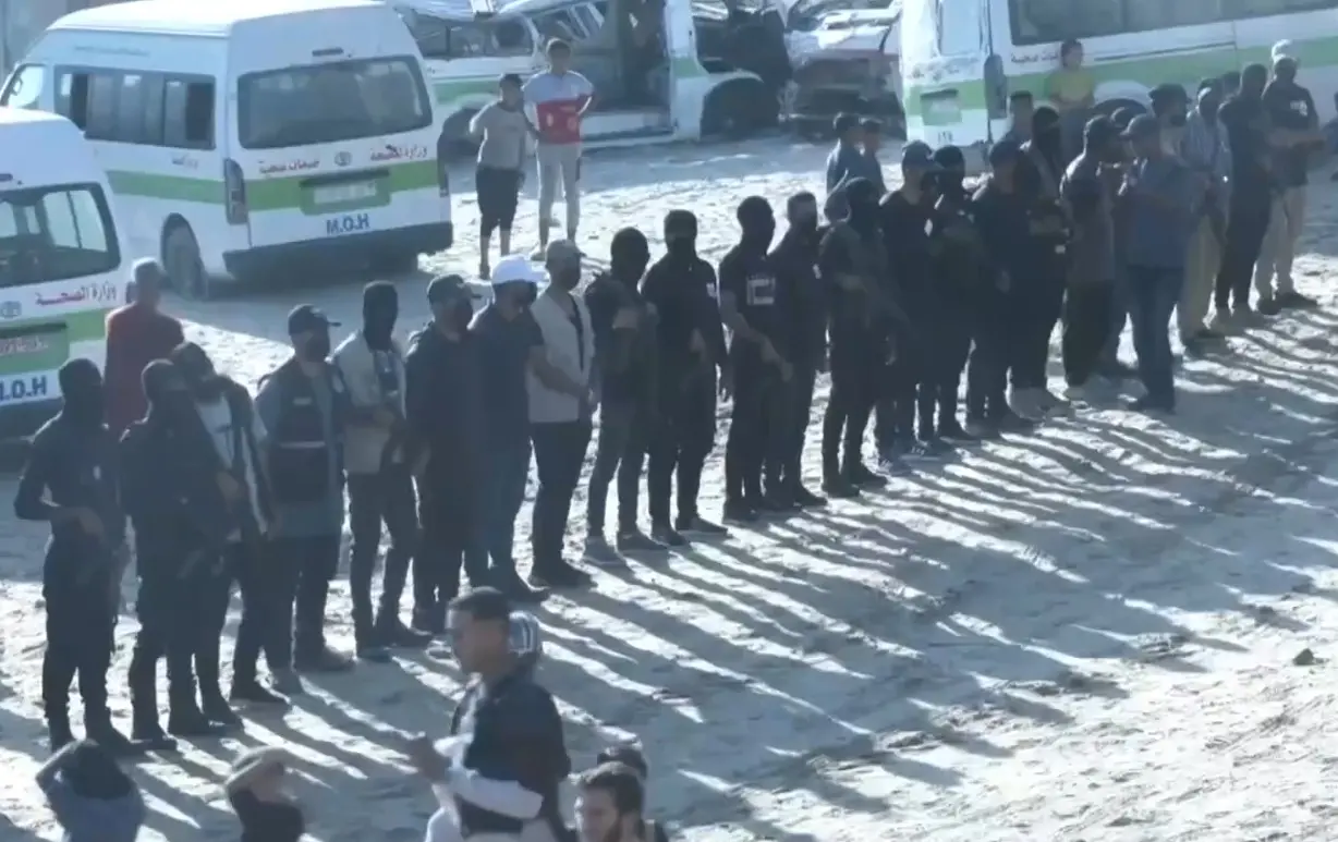 Hamas handing over Israeli hostages to Red Cross | Reuters/Screengrab/X