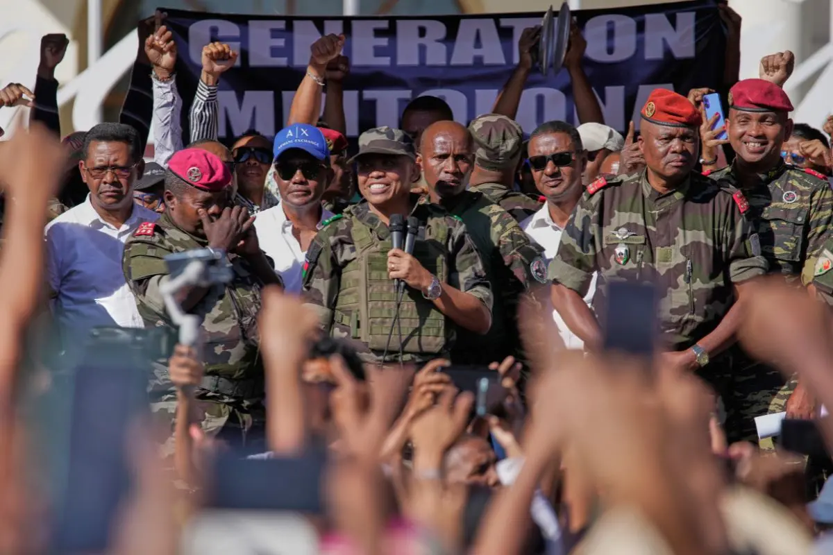 CAPSAT military unit commander Col. Michael Randrianirina announces to protesters that the armed forces are taking control of the country in Antananarivo, Madagascar | Photo: AP