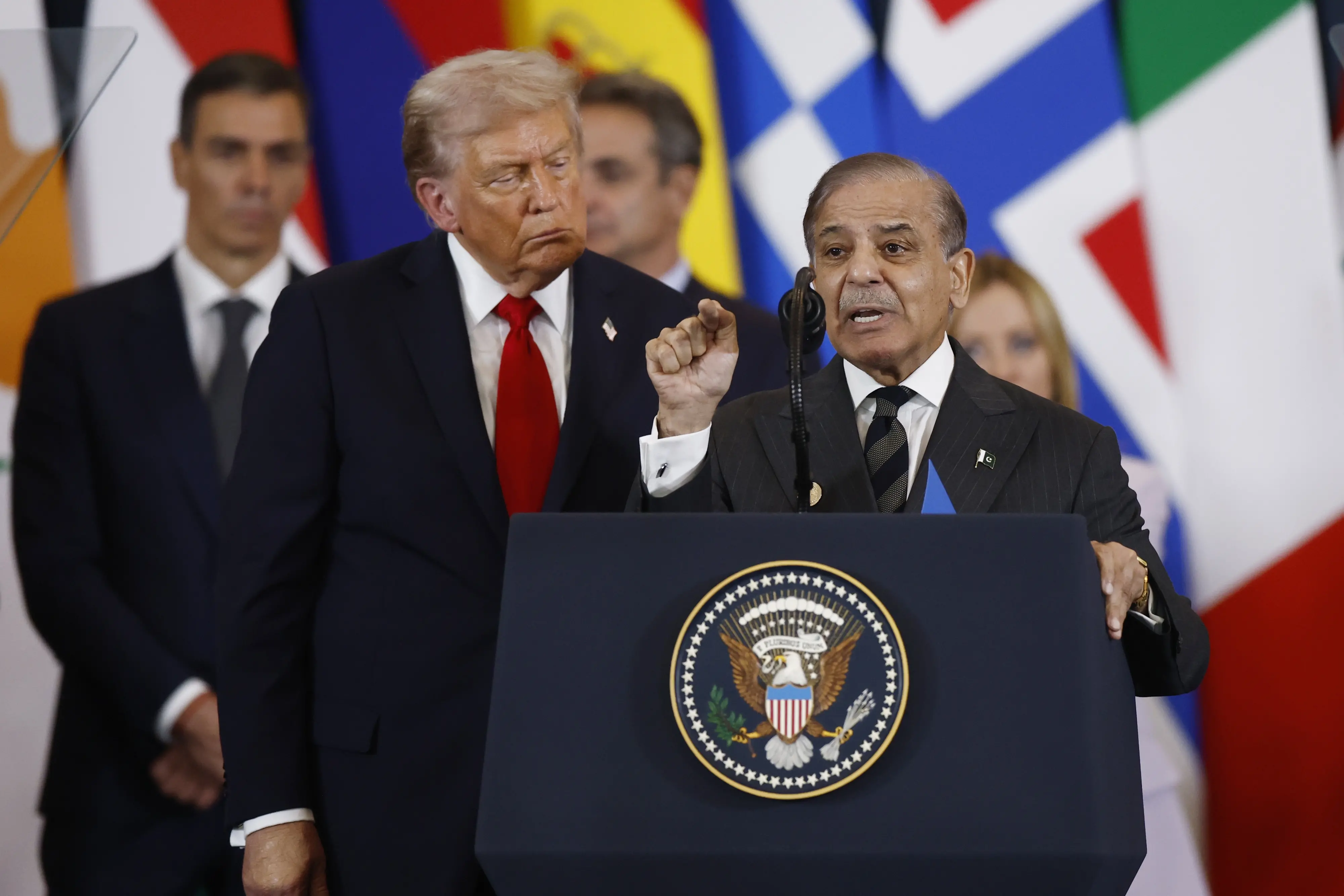 President Donald Trump watches Pakistan's Prime Minister Shehbaz Sharif delivering a speech at the Gaza International Peace Summit, in Sharm el-Sheikh, Egypt. | Photo: AP