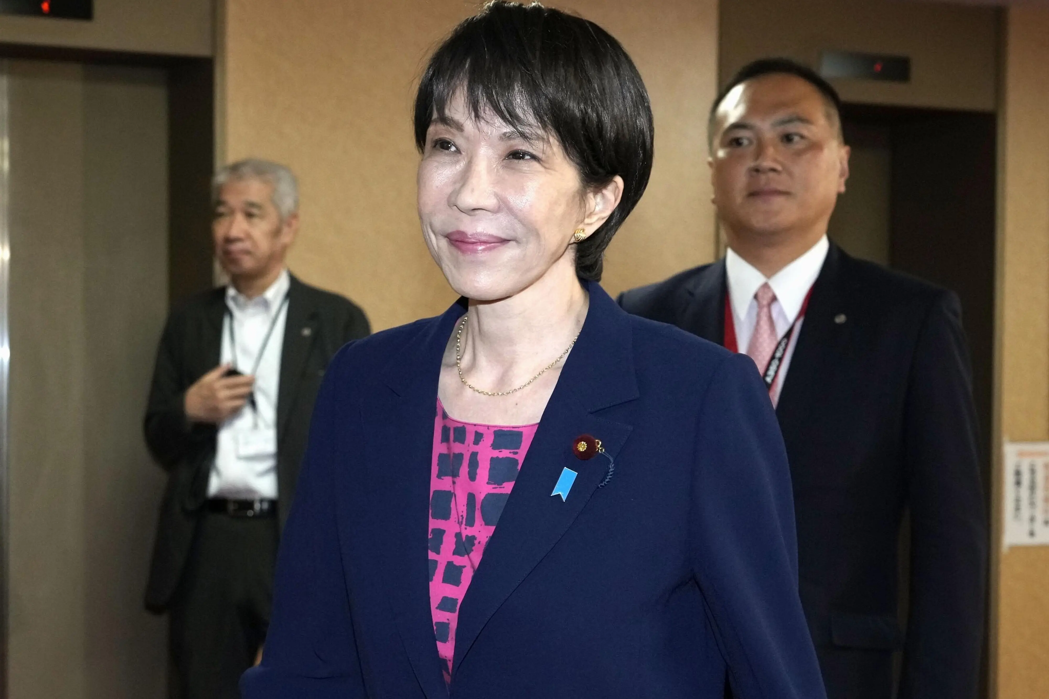 Sanae Takaichi, the newly-elected leader of Japan's ruling party, the Liberal Democratic Party (LDP), leaves the LDP headquarters in Tokyo. | Photo: AP