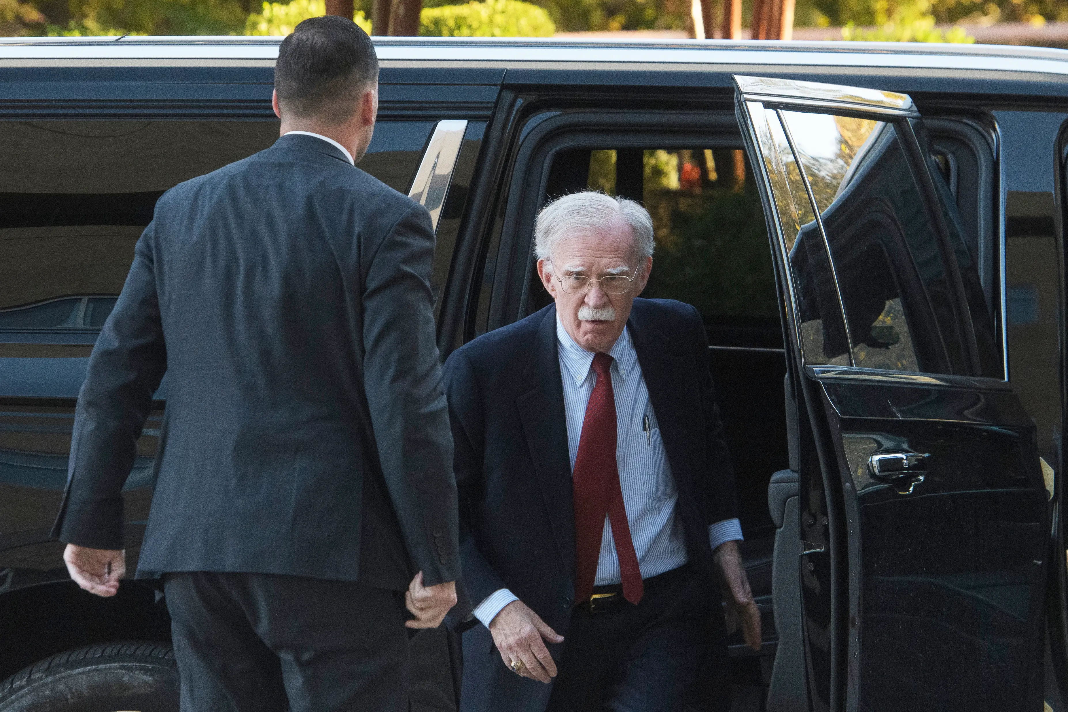 John Bolton arrives for his arraignment at the federal courthouse in Greenbelt | AP