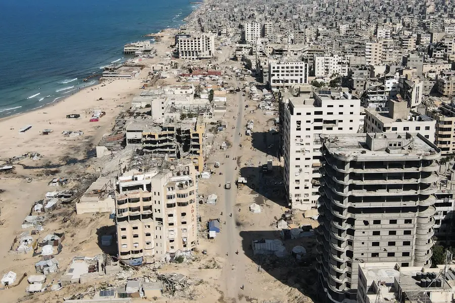 An aerial view shows the war-damaged area surrounding Gaza City's port