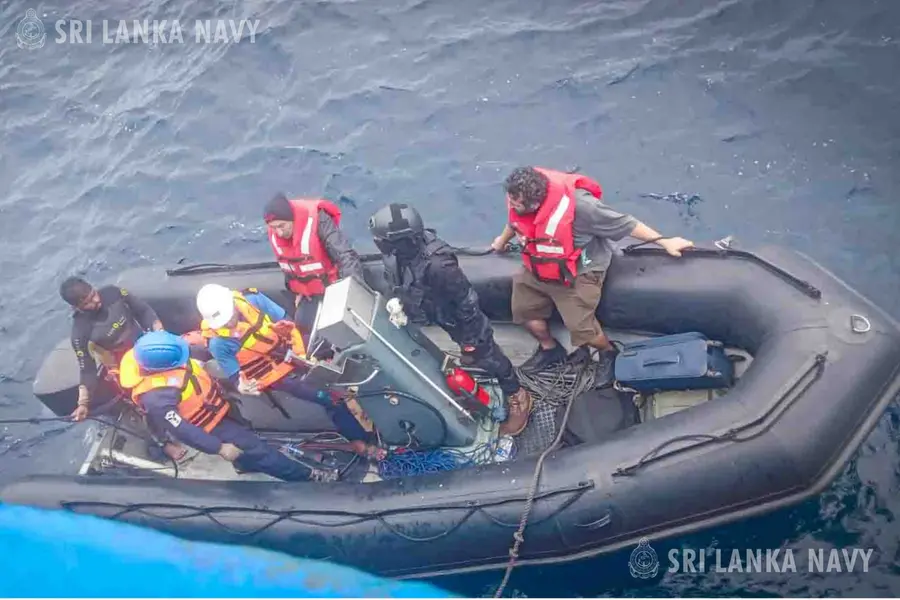 A photo shared by Sri Lankan Navy showing the rescue operation | X