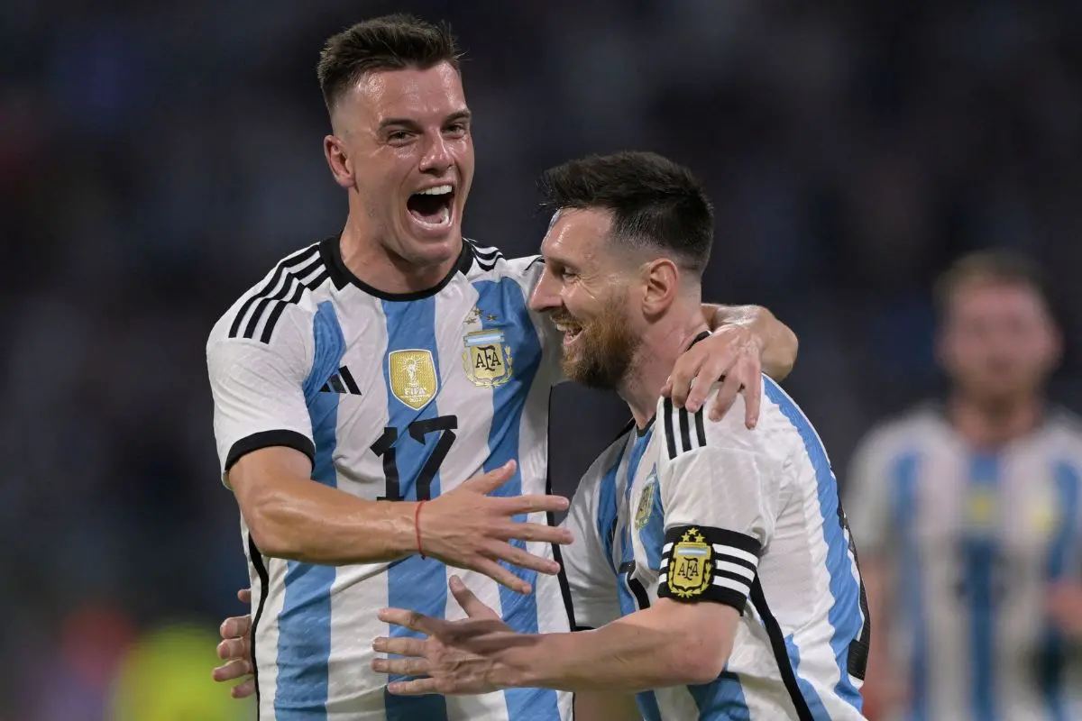 Argentina's forward Lionel Messi (R) celebrates with teammate midfielder Giovani Lo Celso after scoring a goal. | File Photo: AFP