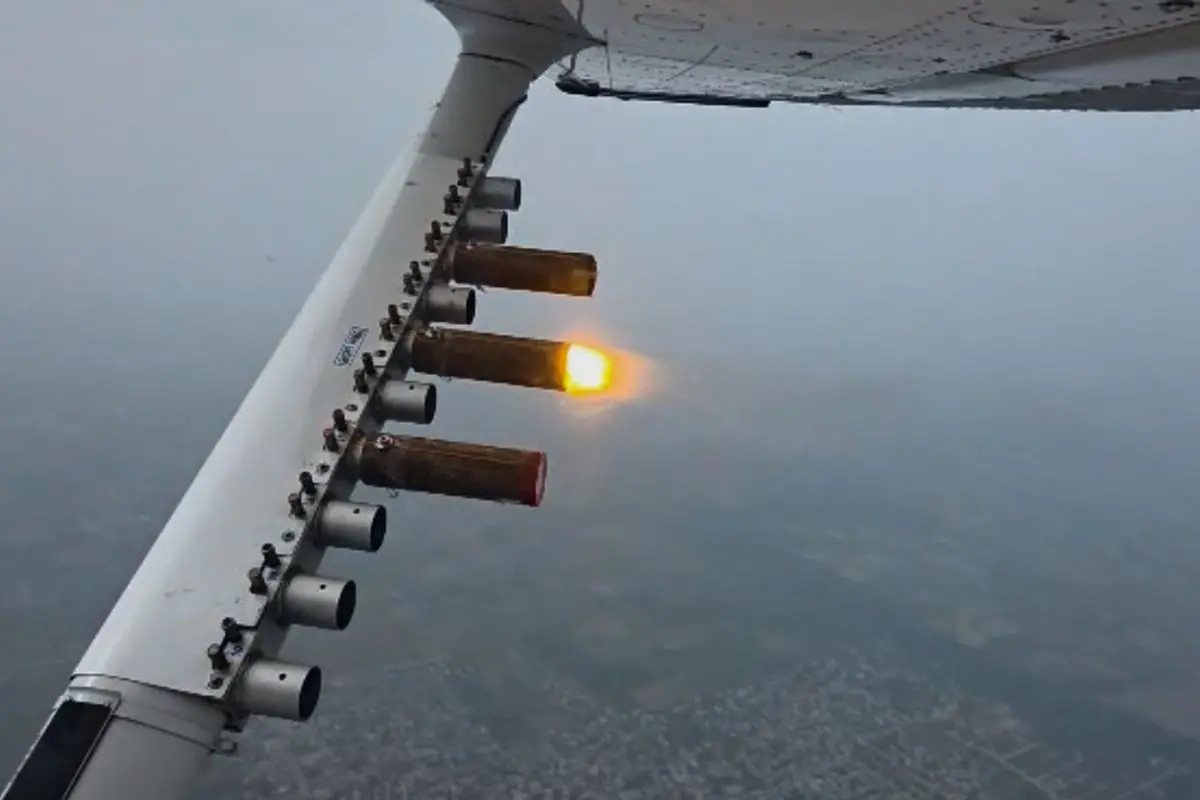In this screen grab taken from the video shared by Indian Institute of Technology, Kanpur, a Cessna 206H plane cloud seeding over Delhi to combat air pollution in the capital, India, Tuesday, Oct. 28, 2025. (Indian Institute of Technology, Kanpur, via AP)