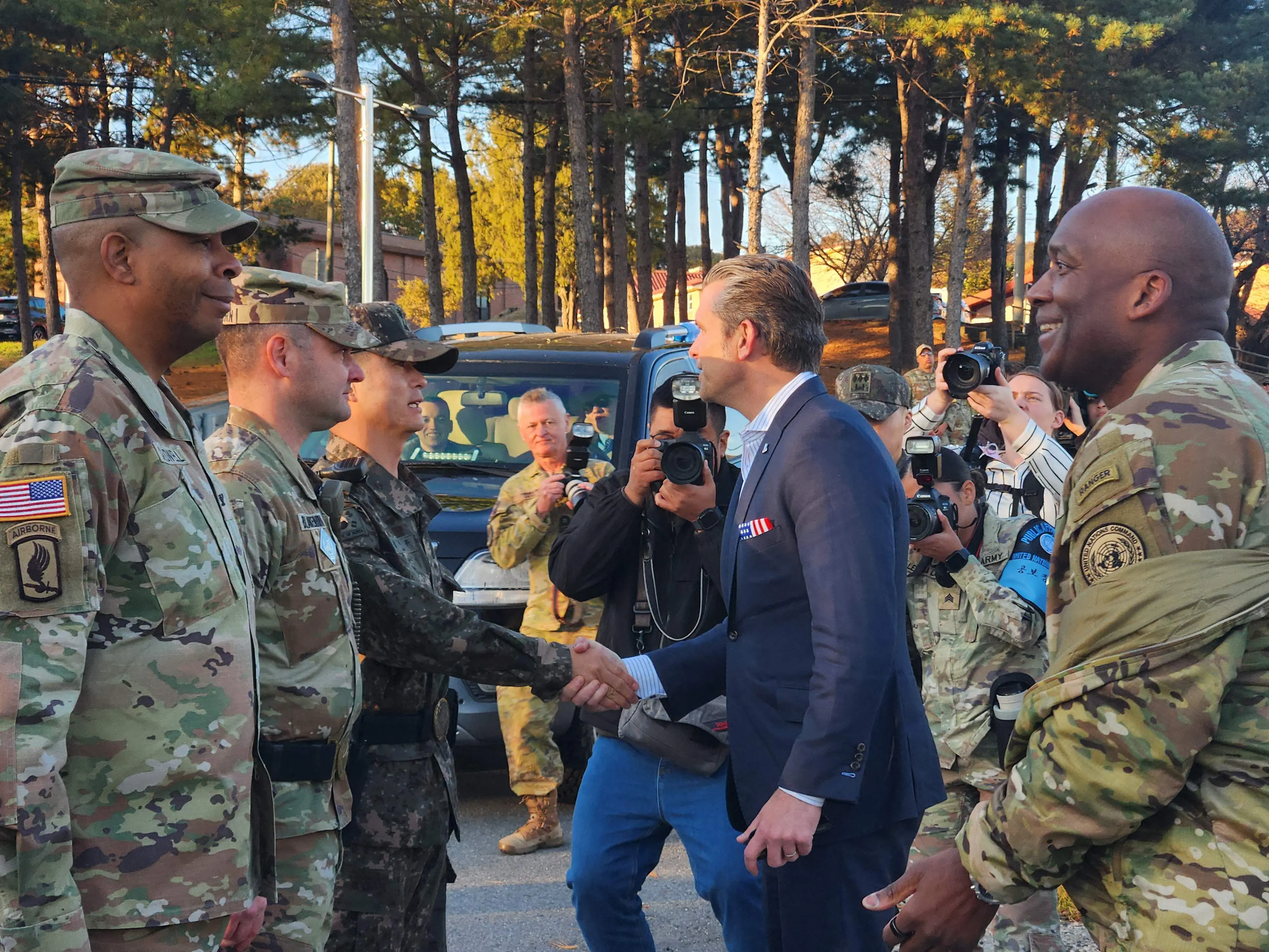 US Defense Secretary Pete Hegseth greets military officers | Photo: AFP