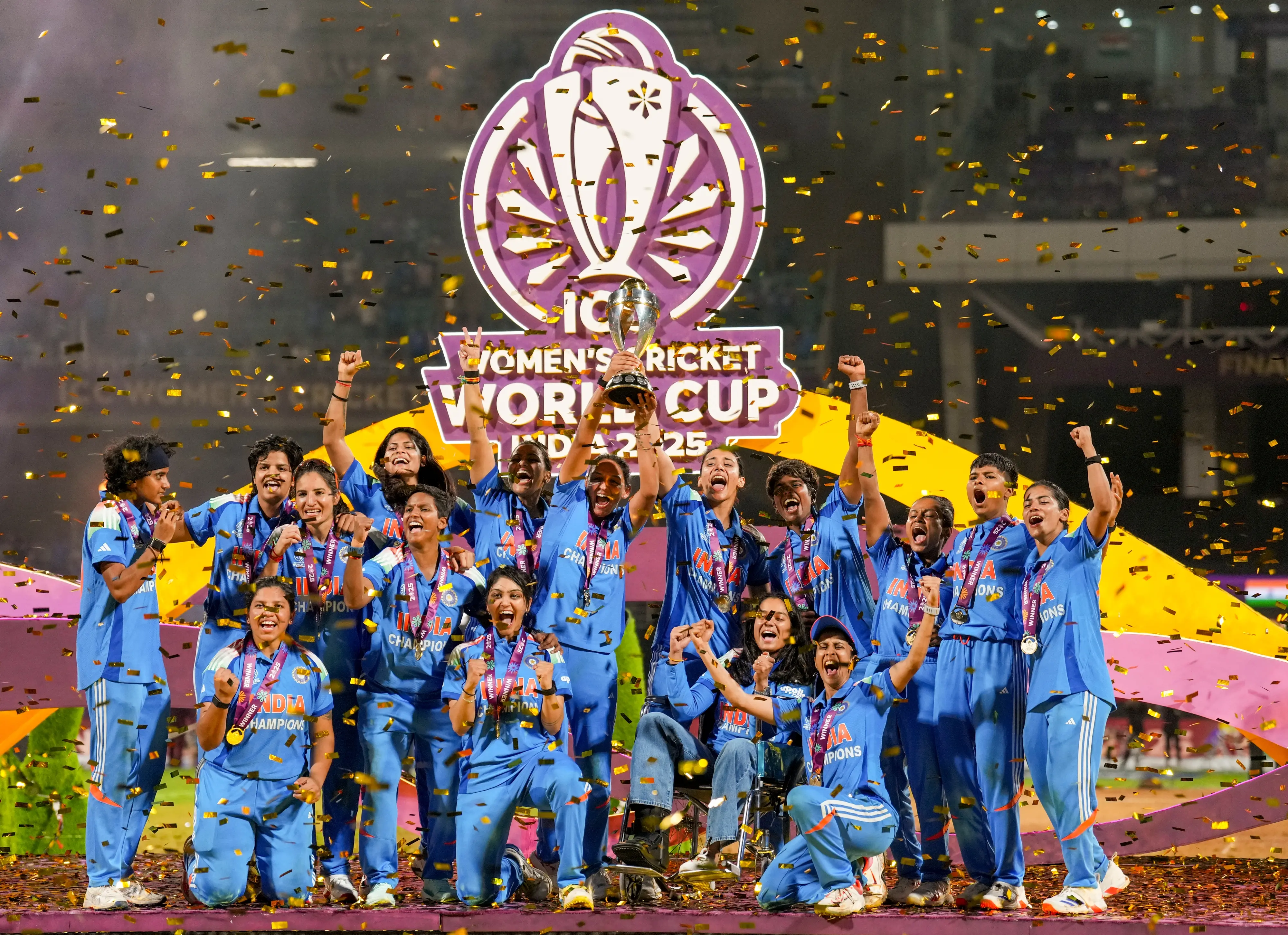 India's players celebrate with the trophy during the presentation ceremony after winning the ICC Women's World Cup | PTI
