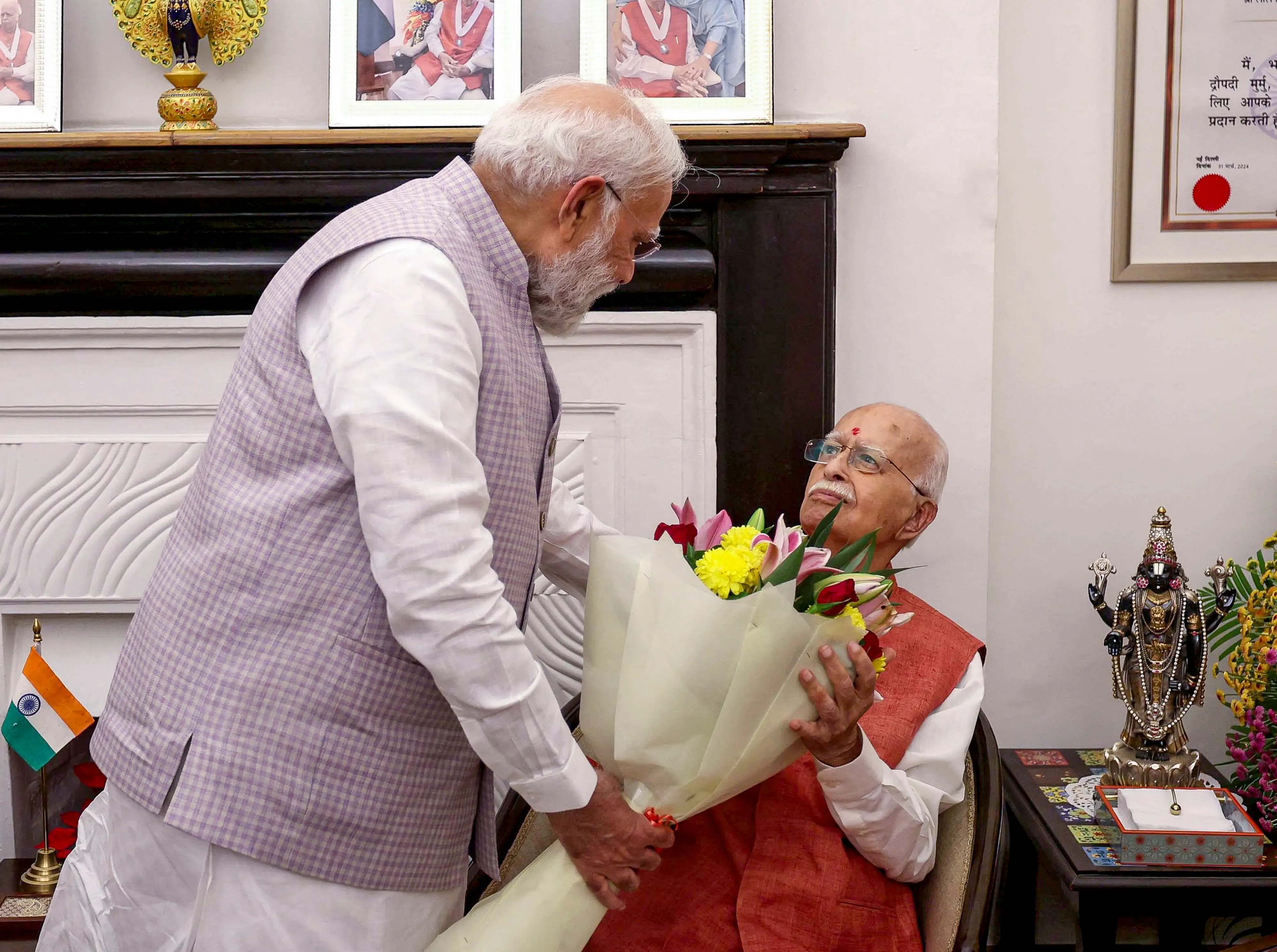 Prime Minister Narendra Modi greets veteran BJP leader Lal Krishna Advani on the latter's birthday, in New Delhi | Photo: PTI