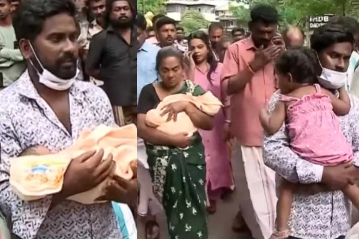 ശിവപ്രിയയുടെ ഭർത്താവ് മനു കൈക്കുഞ്ഞുമായി പ്രതിഷേധിക്കുന്നു |  Photo: Screengrab/ Mathrubhumi News