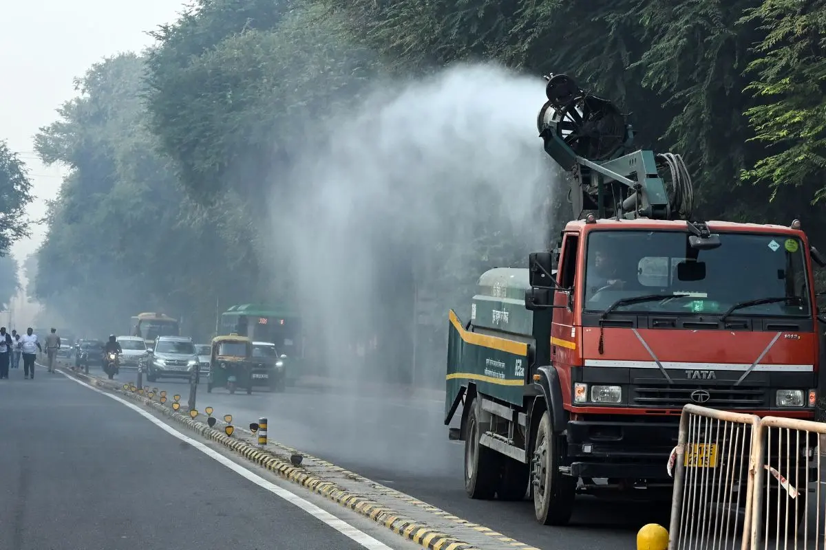 An anti-smog gun sprays water as the Air Quality Index (AQI) reaches 400, in New Delhi on Sunday (Photo: ANI)