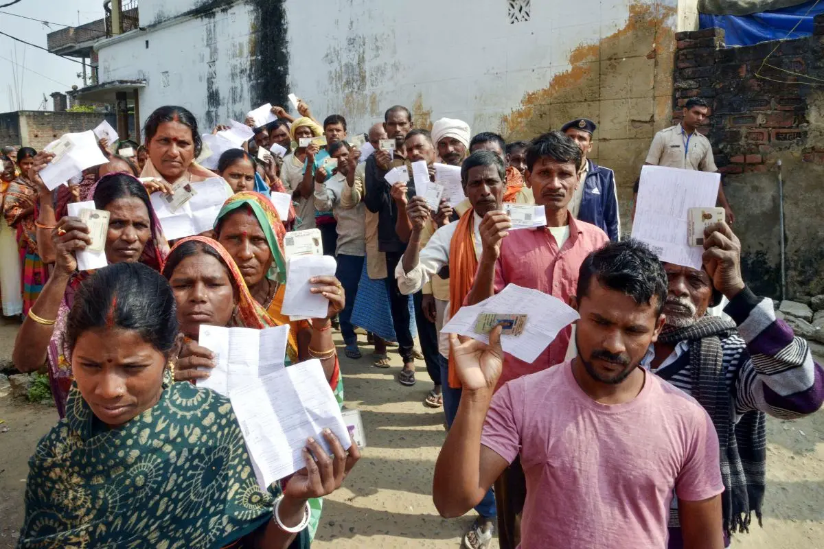 Voters wait in a queue to cast their vote for the second phase of the Bihar assembly election, in Jehanabad on Tuesday (Photo: ANI)