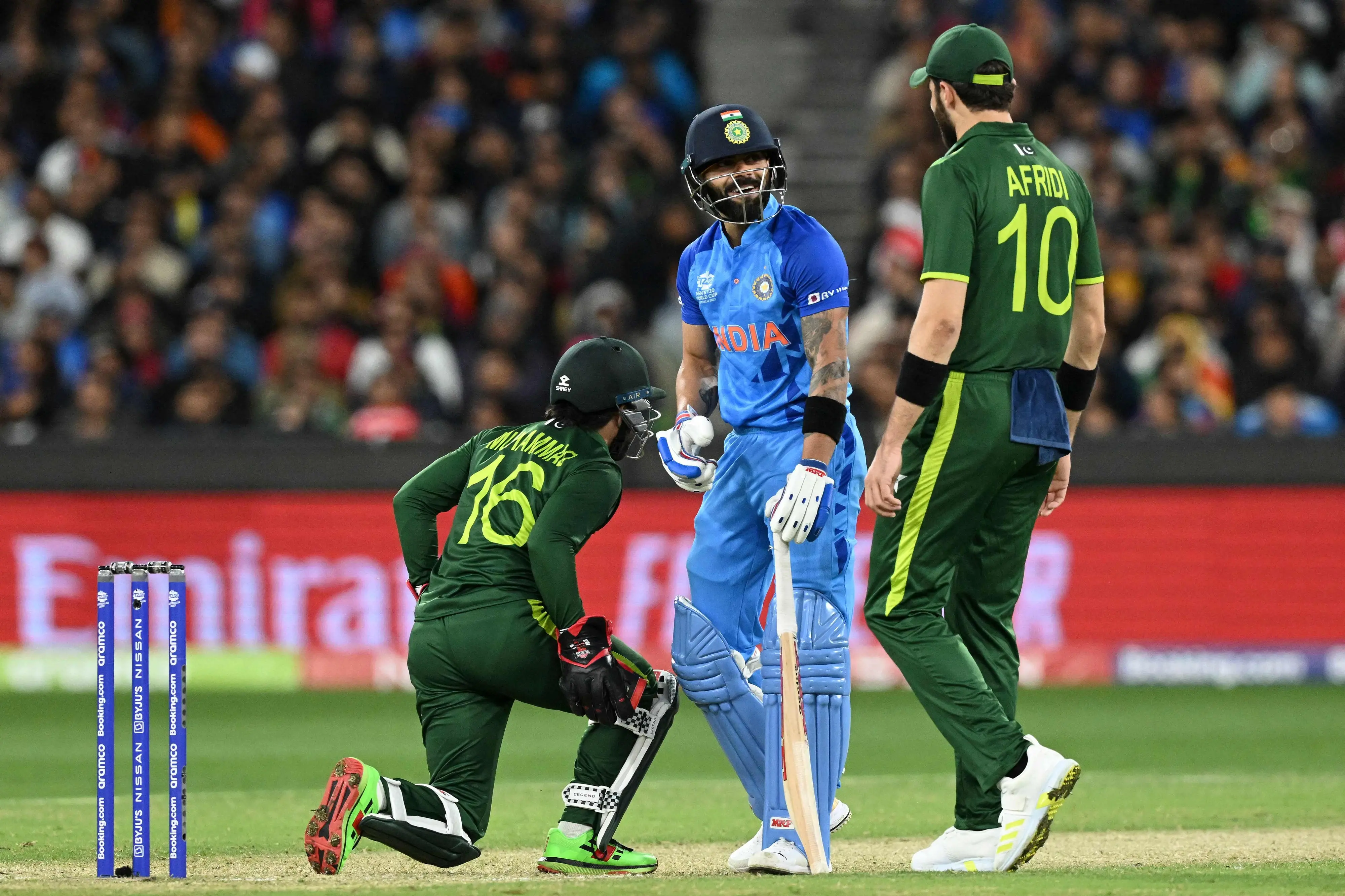 India's Virat Kohli (C) chats with Pakistan's Muhammad Rizwan (L) and Shaheen Shah Afridi during the ICC men's Twenty20 World Cup 2022 cricket match between India and Pakistan at Melbourne Cricket Ground (MCG) in Melbourne on October 23, 2022. | File image: AFP