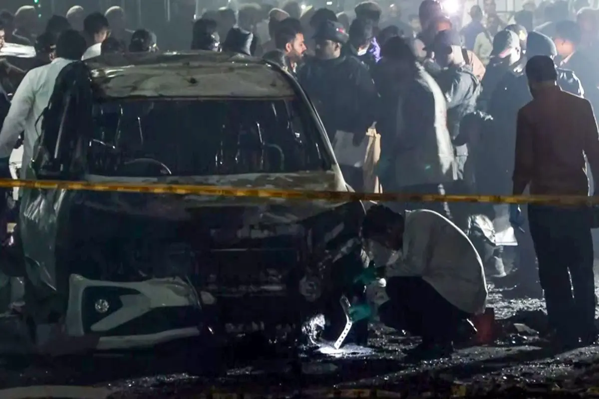 The NSG team investigate the spot of the blast in a Hyundai i20 car near Gate no 1 of the Red Fort Metro station, in Delhi on Monday (ANI Videograb)