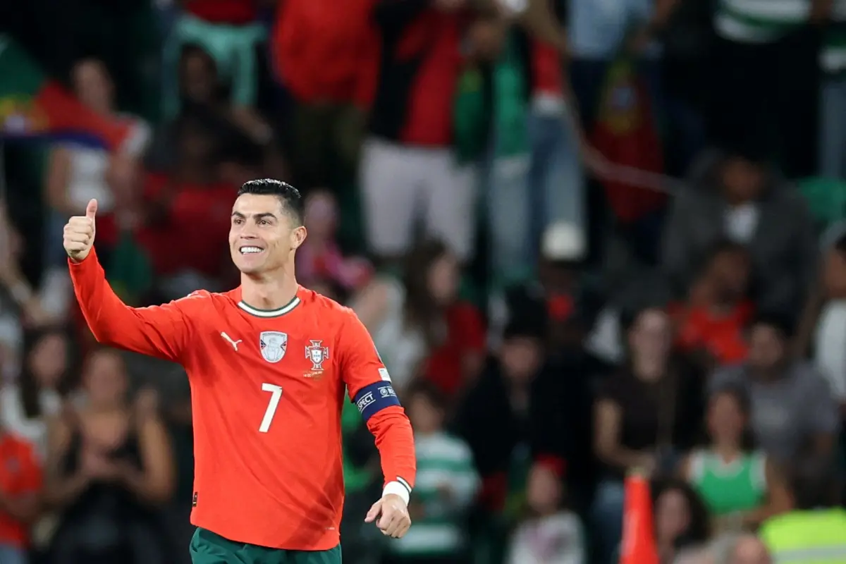 Portugal's forward #07 Cristiano Ronaldo celebrates after scoring the equalising goal during the 2026 World Cup qualifiers Europe zone group F football match between Portugal and Hungary at Jose Alvalade stadium in Lisbon. | Photo: AFP