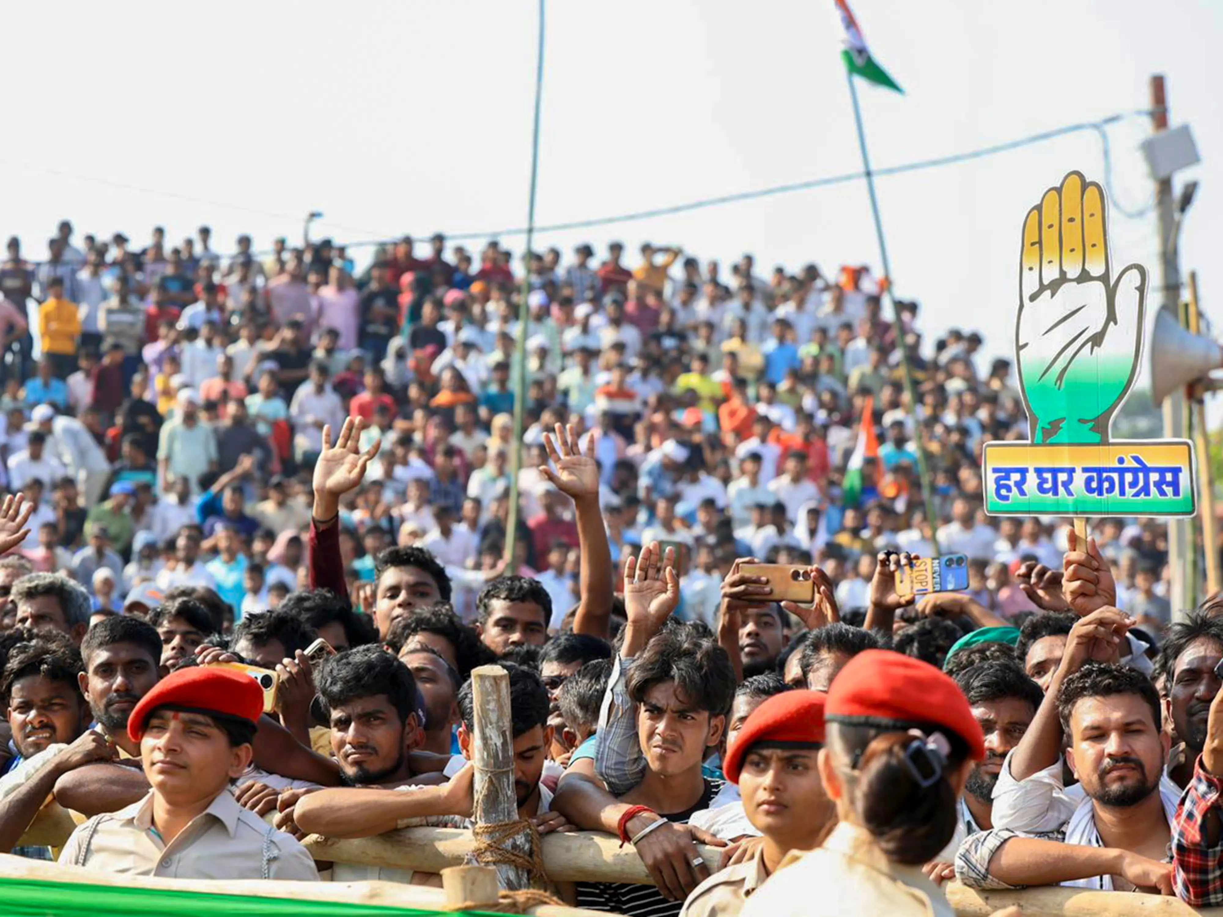 Supporters gather at a rally by LoP in the Lok Sabha and Congress leader Rahul Gandhi, unseen, during Bihar Assembly elections, in Kishanganj | Photo: PTI