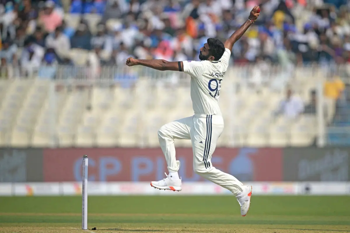 India's Jasprit Bumrah bowls during the first day of the first Test cricket match between India and South Africa at the Eden Gardens in Kolkata. | Photo: AFP