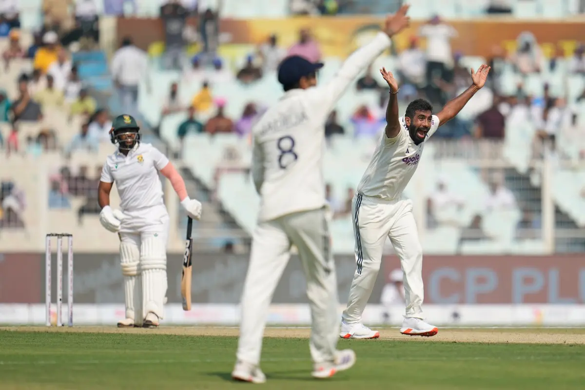 India's Jasprit Bumrah, right, appeals unsuccessfully for the wicket of South Africa's captain Temba Bavuma, left, on the first day of the first cricket test match between India and South Africa in Kolkata. | Photo: AP