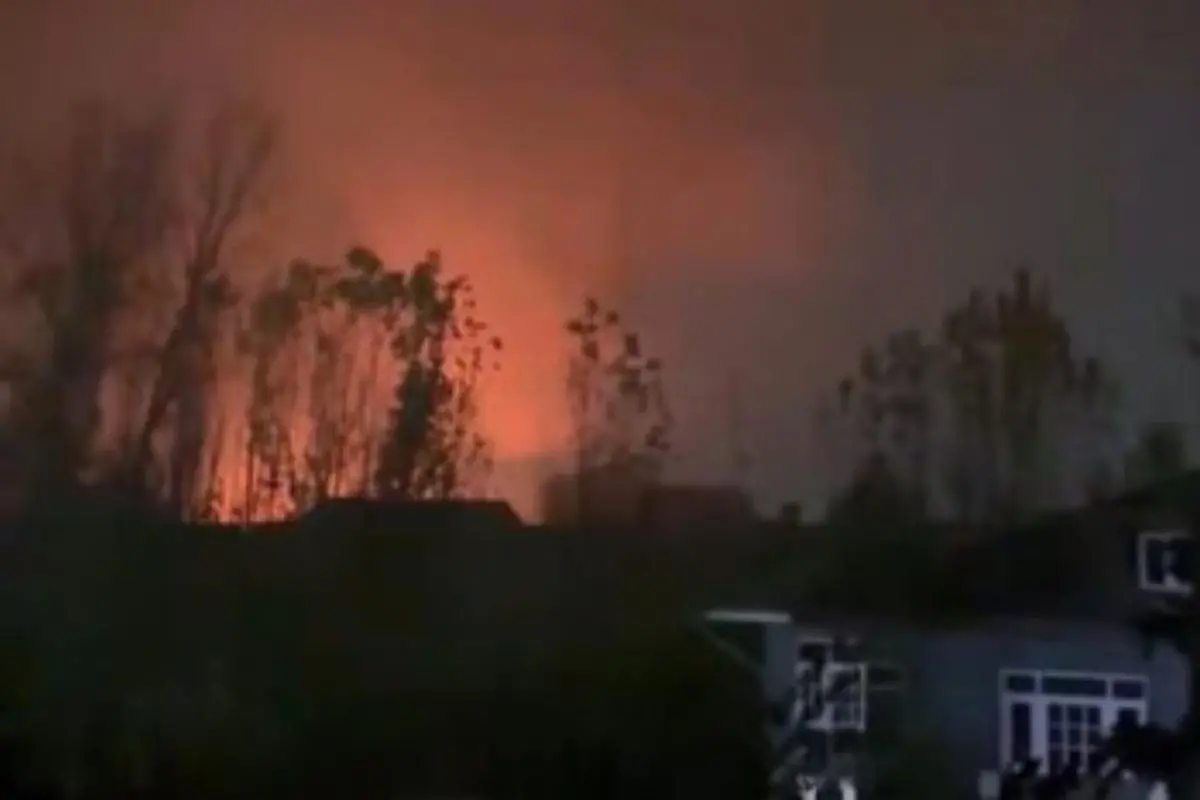 Flames rise amid heavy smoke after a powerful blast, as emergency responders rush to contain the fire. Photo: IANS