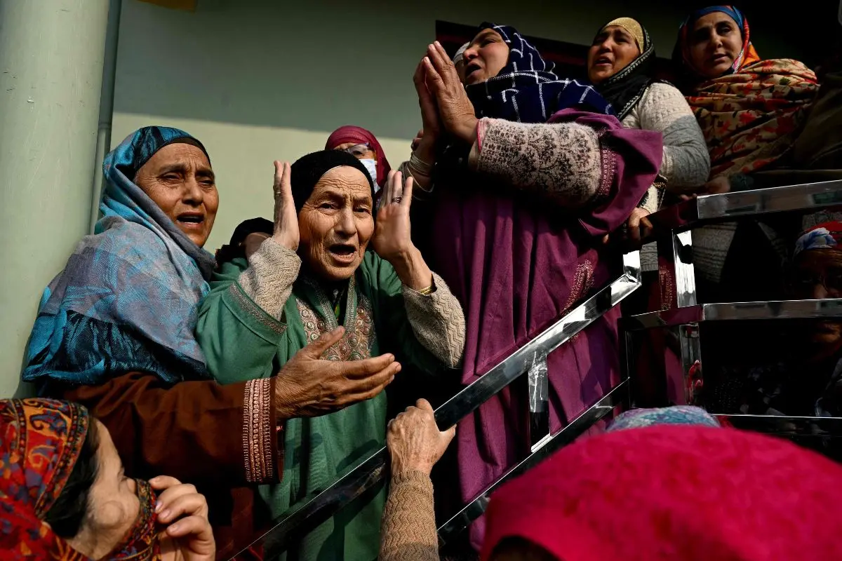 Relatives of the victims who died in an accidental blast at Nowgam police station, mourn in their house on the outskirts of Srinagar | Photo: AFP