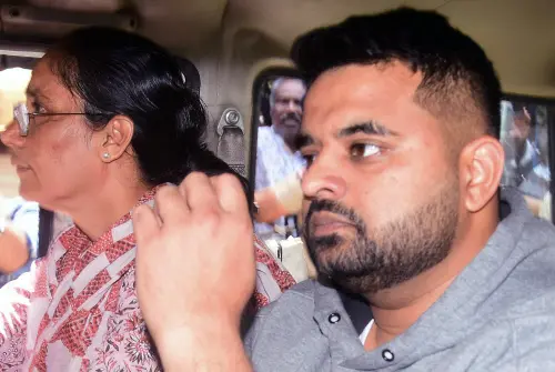 Suspended Janata Dal (Secular) (JD-S) MP Prajwal Revanna, who was arrested by SIT in the alleged obscene video case at the Bengaluru Airport after he landed, being taken to Bowring and Lady Curzon Hospital for a medical examination, in Bengaluru. l File Photo: ANI