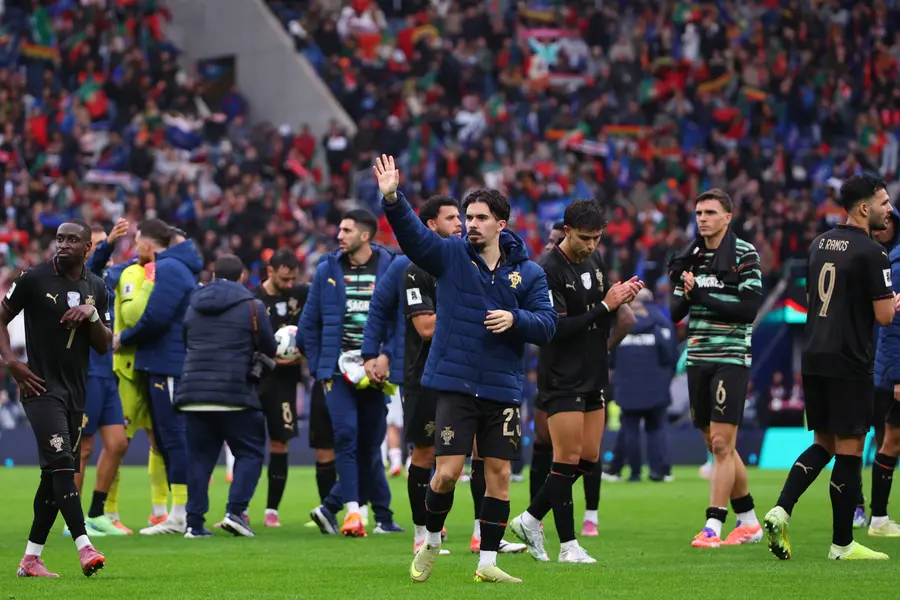 Portugal's Vitinha waves at the end of a World Cup 2026 group F qualifying soccer match between Portugal and Armenia